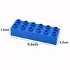 A blue set of large building blocks with various sized cylindrical pieces.