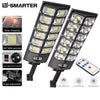 A black motion-activated solar garden light with multiple LED panels and an angle adjustable feature.