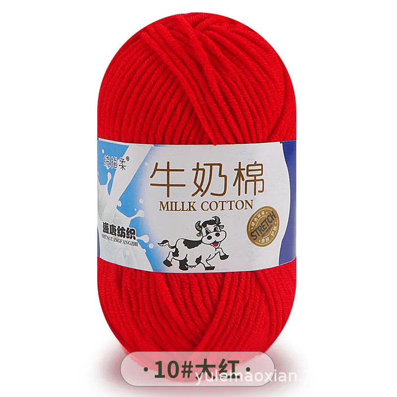 A ball of red milk cotton blend yarn labeled for knitting and crochet projects.