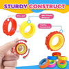 A hand holds and manipulates various colorful silicone fidget rings made from ABS plastic material.