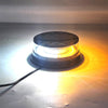 An LED emergency strobe light mounted on a magnetic base, emitting a bright white light.