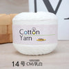 A ball of white cotton yarn labeled as Cotton Yarn 100g for knitting and crochet.
