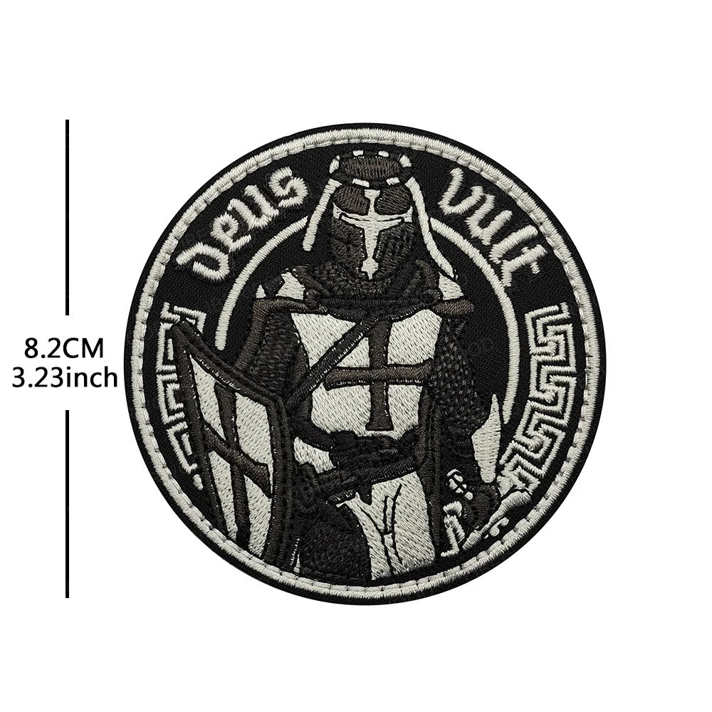 Black embroidered patch featuring a knight with a cross and the Latin phrase Deus vult.