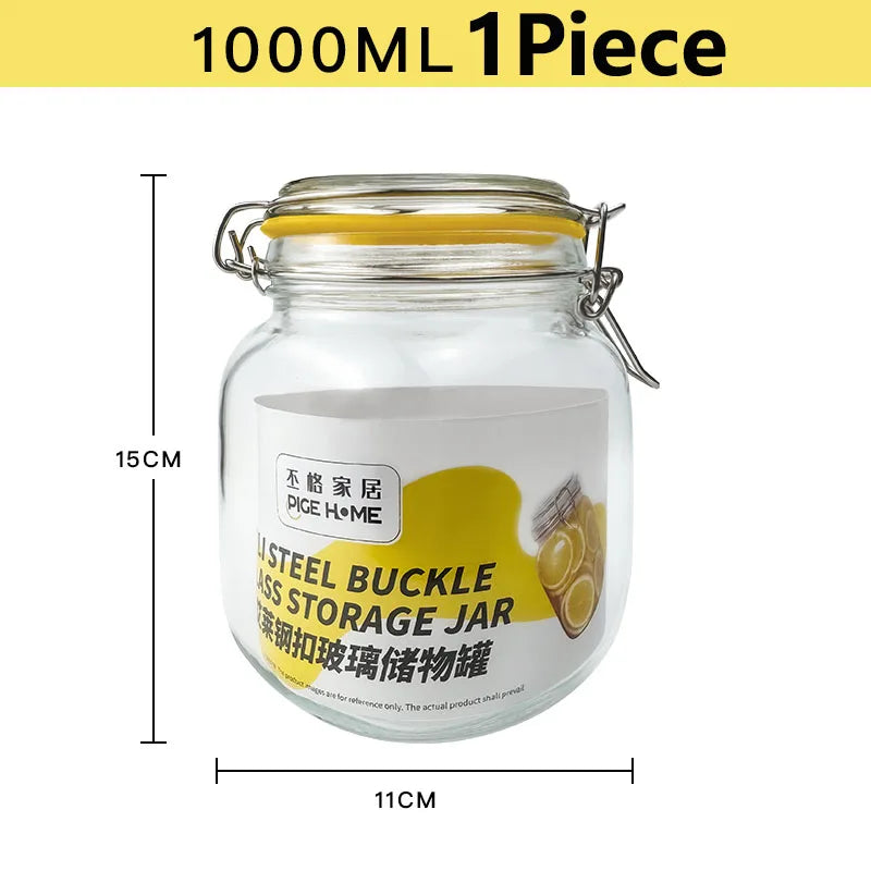 A clear glass storage jar with a yellow silicone seal and metal clamp, labeled for steel buckle storage.