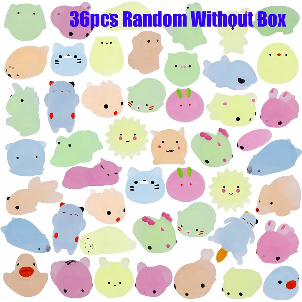 A collection of 36 assorted kawaii animal squishies in various pastel colors and shapes.
