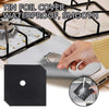 A hand places a black tin foil cover onto a stove burner mat for waterproofing and smooth use.