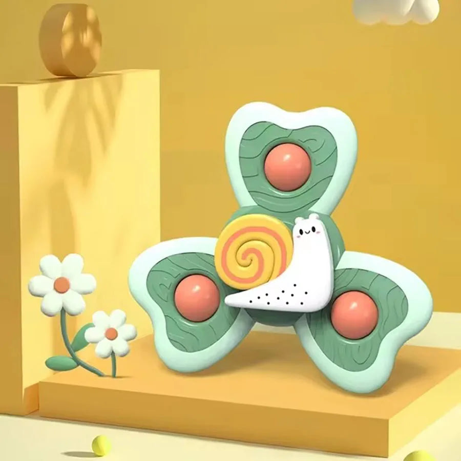 A set of insect-themed suction cup bath toys featuring green and pink shapes for toddlers.