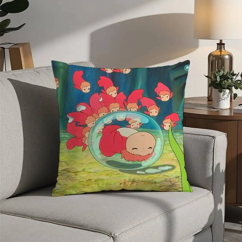 A colorful cartoon pillow featuring red and orange fish characters swimming in blue water against a green background.