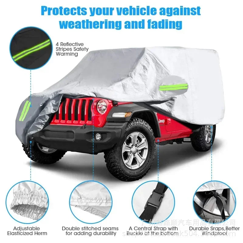 A white and gray outdoor car cover protecting a Jeep Wrangler against weathering and fading.