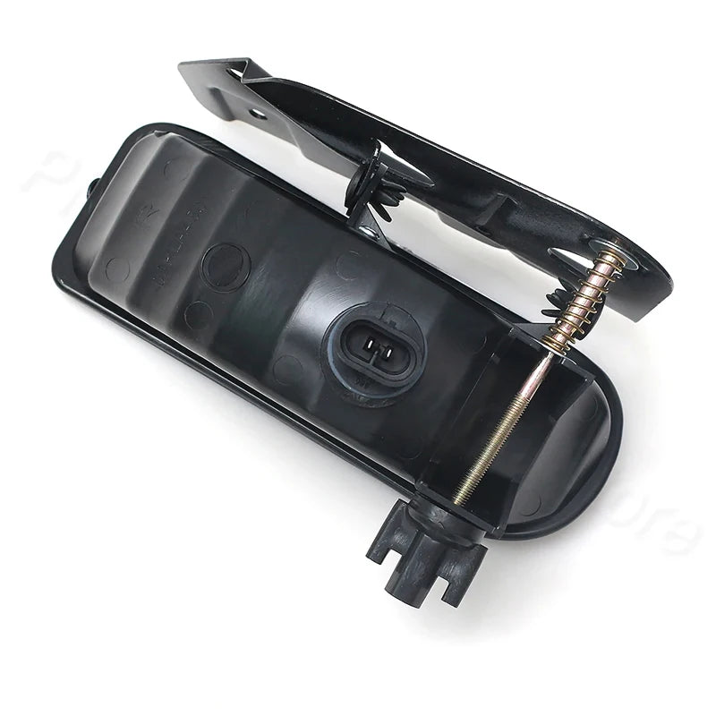 Black Cadillac Escalade front fog light assembly with bulbs for 2002-2006 vehicles.