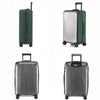 A set of dark green and silver waterproof suitcase covers with easy access zippers.