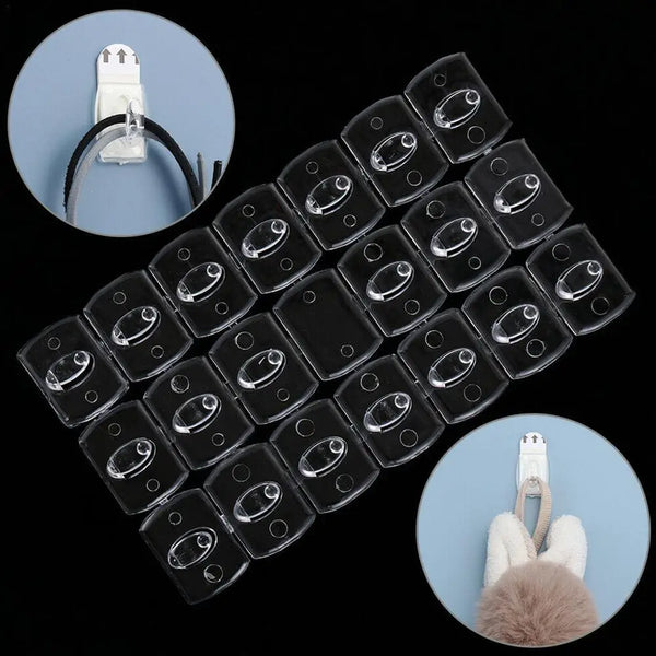 Transparent removable adhesive hooks for cable management shown in a grid and with a fluffy white object.