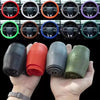 A variety of silicone steering wheel covers in different colors and patterns are displayed, along with rolled-up black and gr