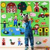 A child stands in front of a large green felt board depicting various farm animals and farm-related objects.