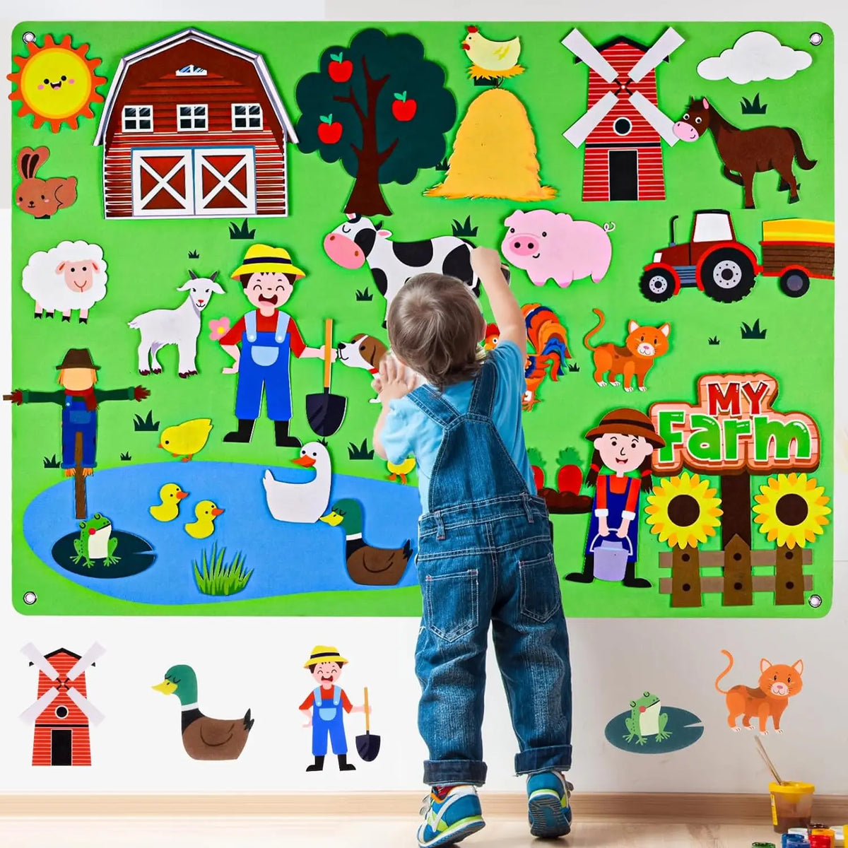 A child stands in front of a large green felt board depicting various farm animals and farm-related objects.