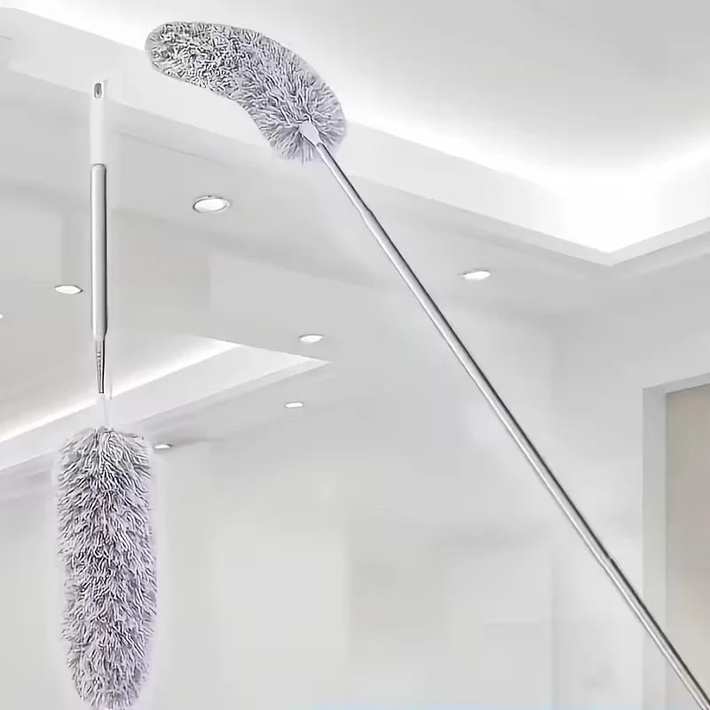 A silver extendable microfiber duster with a fluffy head hanging from the ceiling.