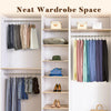 A neat wardrobe space featuring wooden shelves and hanging rods organized with stainless steel clothespins and hooks.