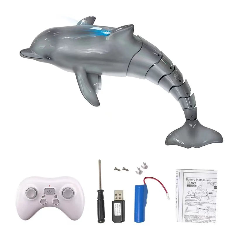 A gray remote control shark toy with blue lights, controller, and battery installation instructions.