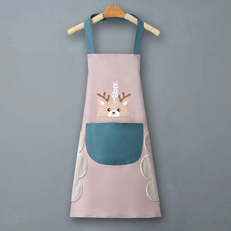 A light pink waterproof kitchen apron featuring a cute deer face design and teal accents.