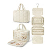 A beige portable hanging toiletry bag with a quilted design shown in various forms.