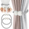 Pearl magnetic curtain tiebacks in gray and white, shown with hands and separate loops.