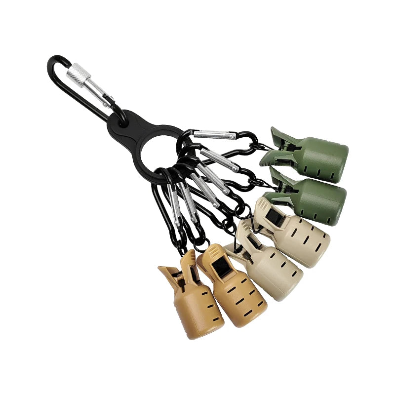 A black squid jig protector kit featuring multiple hooks and a carabiner for fishing.