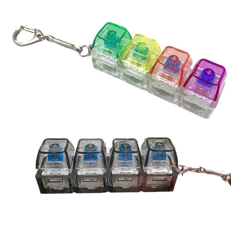 A set of colorful LED light-up keyboard fidget toys attached to a silver keychain.