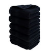 A stack of six black premium pure cotton face towels.