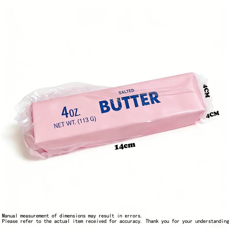 A pink salted butter block squishy fidget toy packaged in a clear plastic bag.