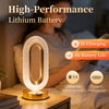 A woman is using a High-Performance Lithium Battery crystal star moon night light on a bedside table.