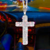 A silver stainless steel cross pendant adorned with sparkling rhinestones hanging from a chain.