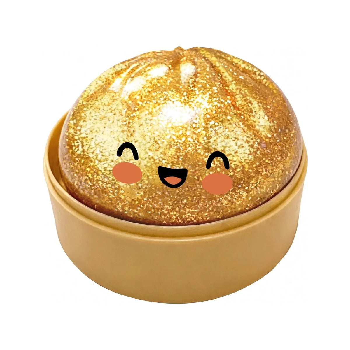 A round, golden glittery squishy dumpling fidget toy resting in a light beige dish.