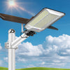 A solar street light fixture mounted on a pole, ready for dusk to dawn operation.