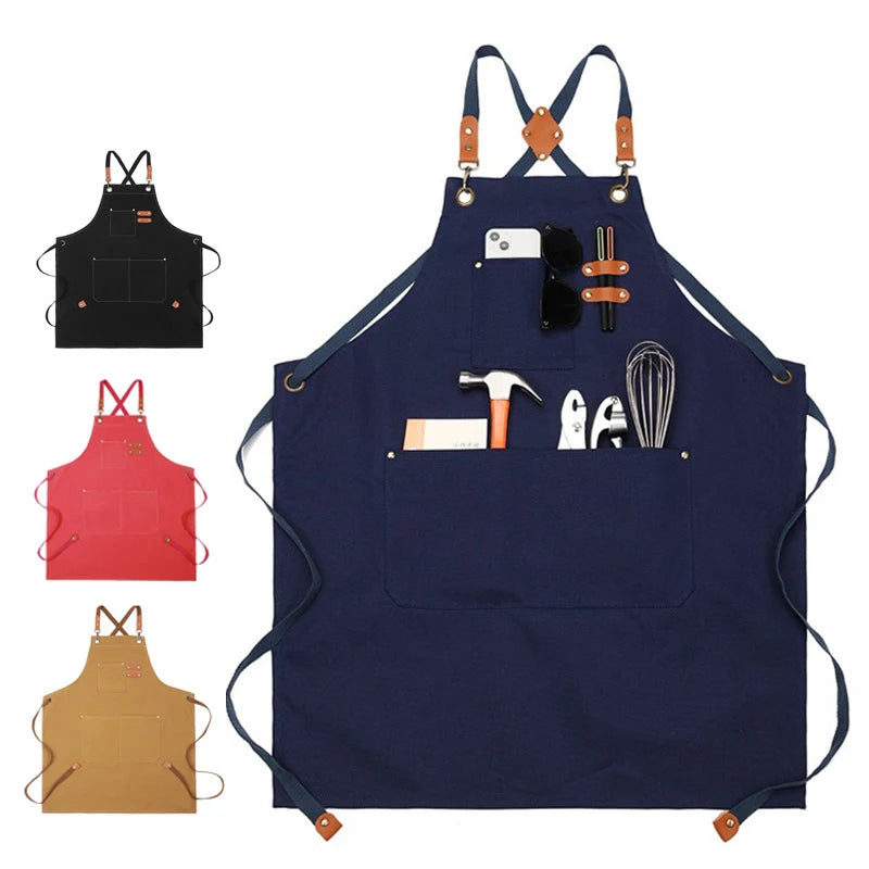 Navy blue professional chef apron with cross-back straps and multiple tool pockets