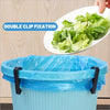 A blue plastic garbage bag holder with double clip fixation is shown next to a plate of lettuce.
