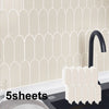A set of five cream-colored 3D tile sheets for a kitchen backsplash installation.