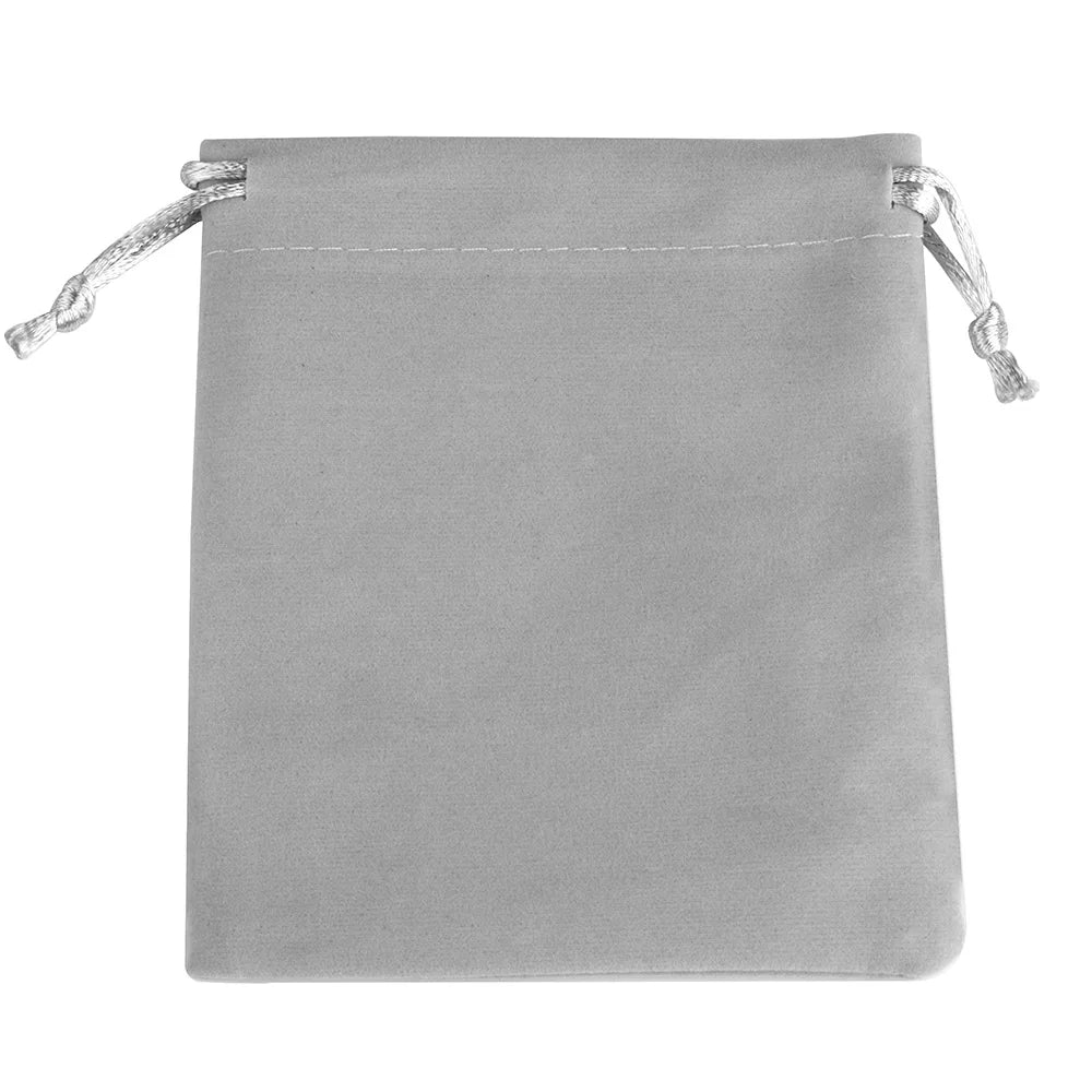 A soft gray velvet drawstring jewelry pouch with light-colored cord ties.