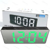 A rectangular LED clock display showing 10:08, packaged in a white box.