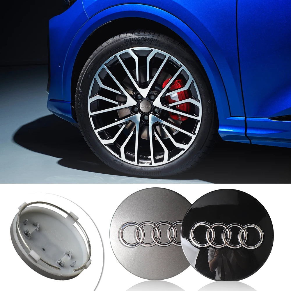 Close-up view of an Audi center hub cap decorative wheel cover and its mounting hardware.