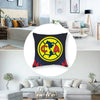 A decorative pillow featuring the Club America logo in yellow and black on a dark background.