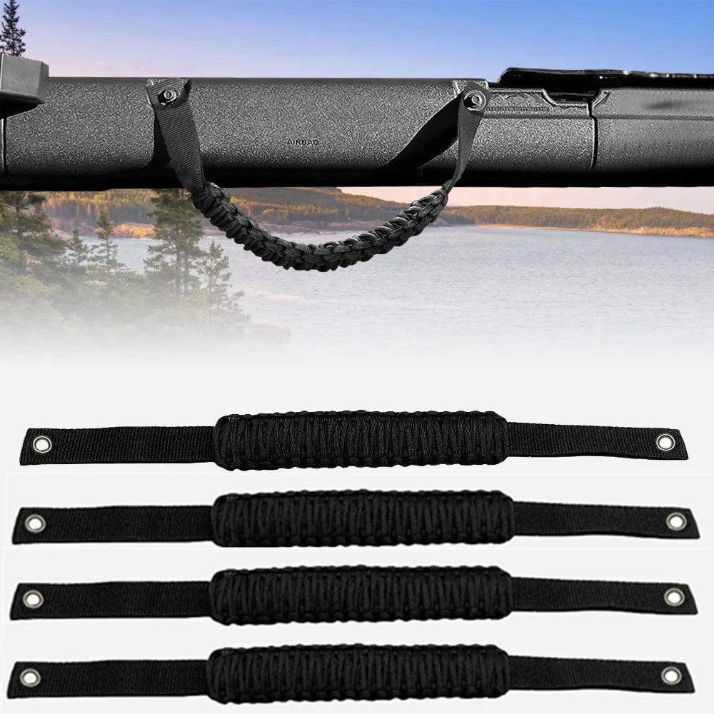Black paracord grab handles for a Ford Bronco, shown attached to the vehicle's exterior.