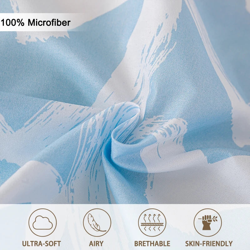 Light blue and white microfiber fabric showing a heart print pattern in a draped fold