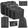 A set of black travel packing cubes and storage organizer bags for clothing.