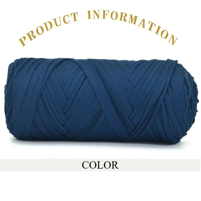 A skein of dark blue thick polyester blend yarn for knitting and crochet.