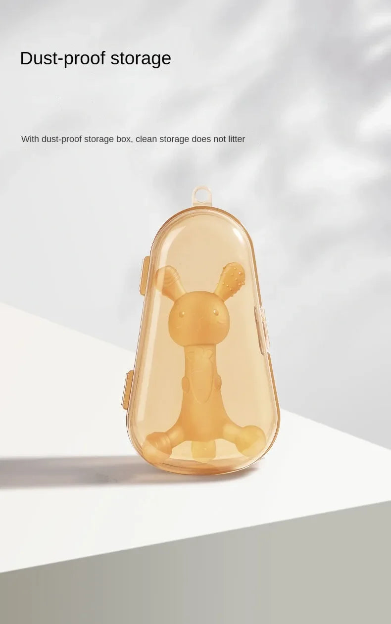 A clear silicone cartoon rabbit teether in a storage box, demonstrating dust-proof storage.