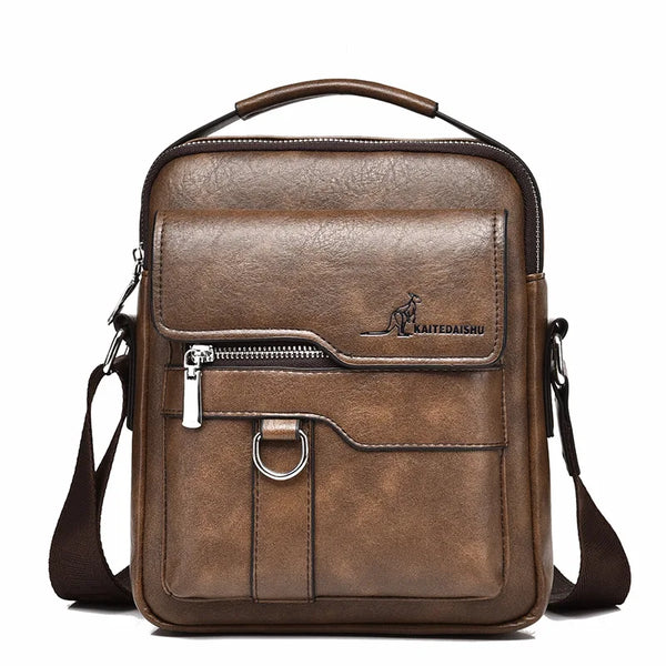 A brown vintage leather messenger bag with a flap and zipper, featuring a leather strap.