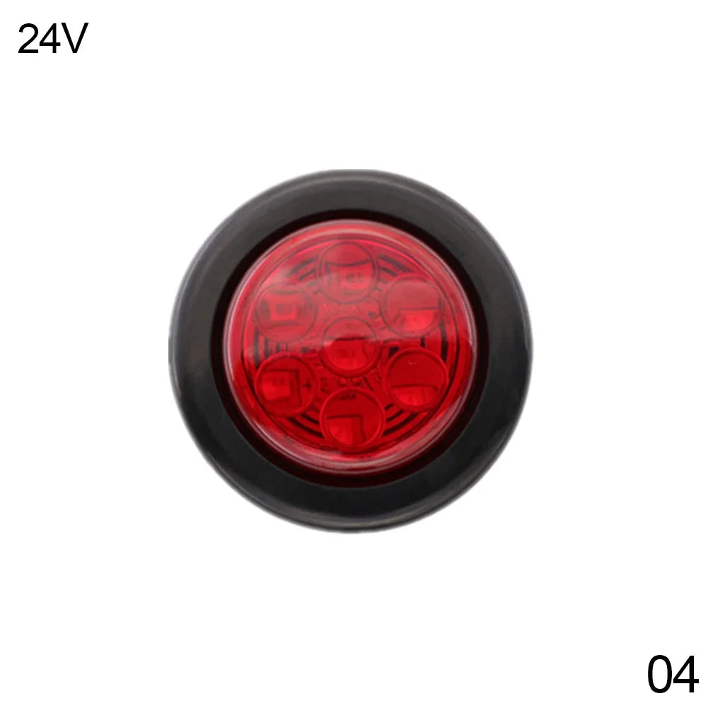 A round red LED light assembly for a vehicle tail light.
