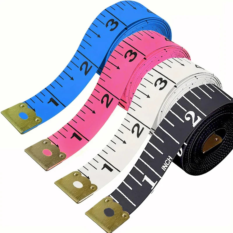 A roll of flexible soft tape measure with dual-sided markings in blue, pink, and white.