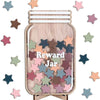 A wooden jar decorated with colorful star cutouts used as a reward for positive behavior.