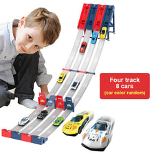 A wooden track set for racing cars with eight die-cast cars and a boy demonstrating the product.